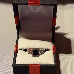 Elegant Silver Ring with Blue Gemstone